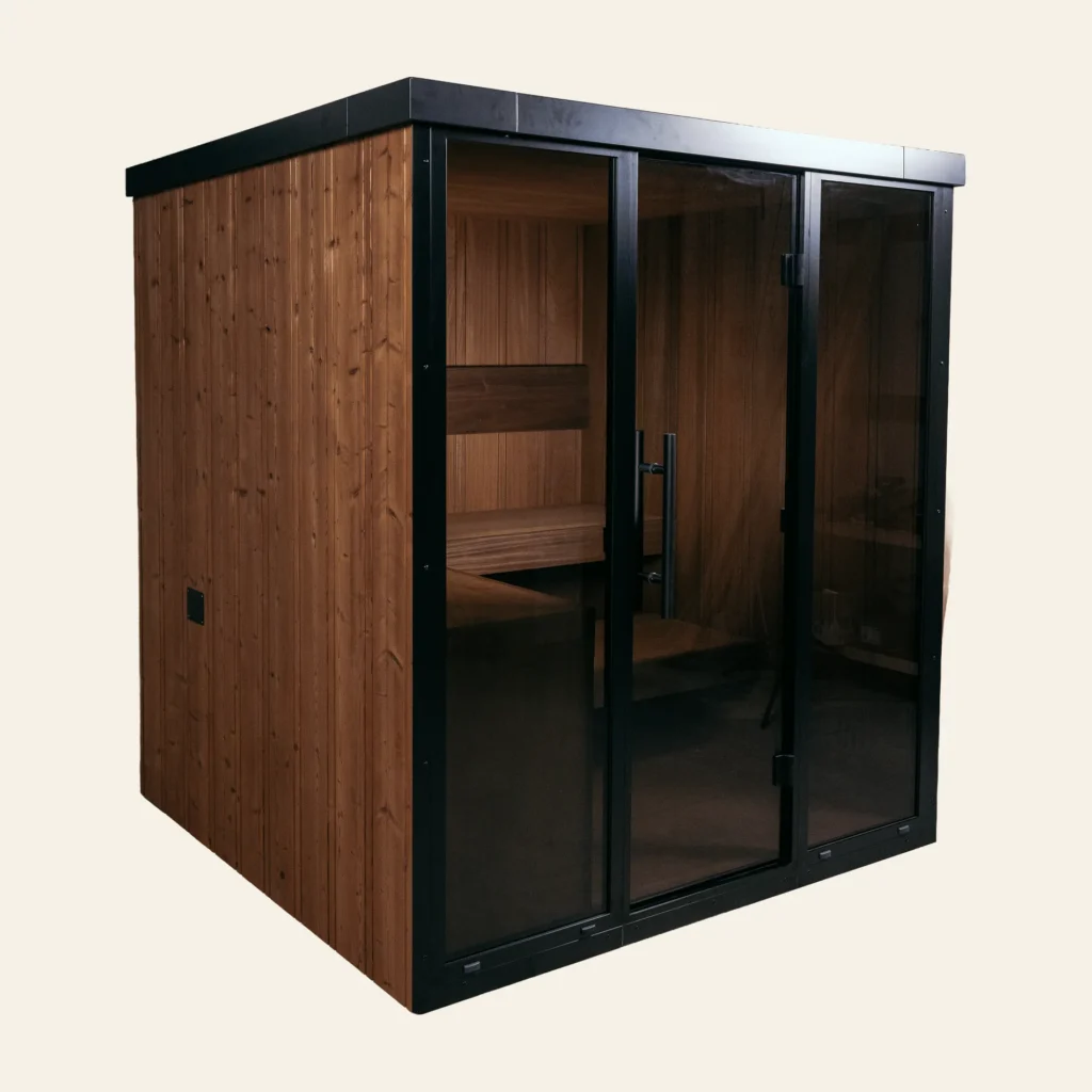 OneEighty Large Outdoor sauna in natural thermo spruce, angled view with black aluminium glass front