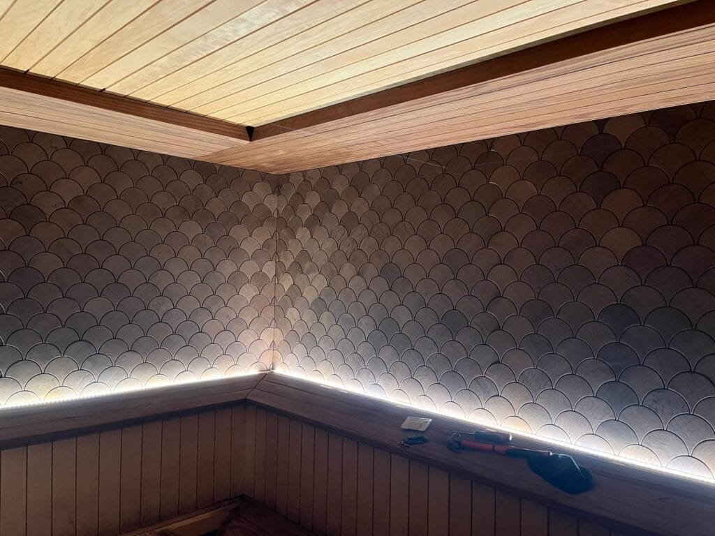 Fish Scale wood panel sauna wall with LED lighting