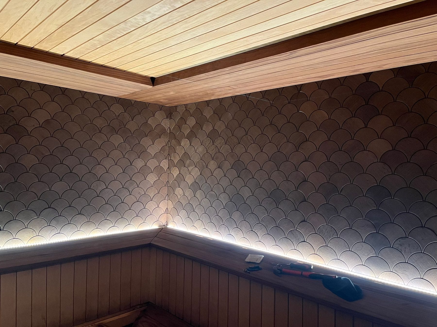 Fish Scale wood panel sauna wall with LED lighting