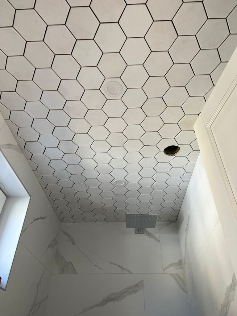 Promenade XL white honeycomb wood ceiling in a bathroom, EmotionWood