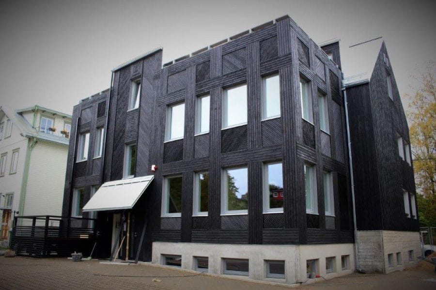 Charred yakisugi timber cladding on a modern apartment building